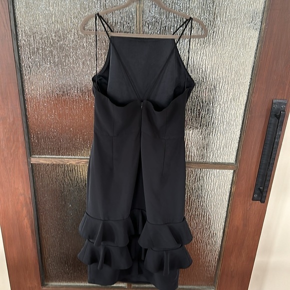 Christian Siriano black halter ruffle dress
Arabella size 14 $1100 retail - Picture 14 of 14